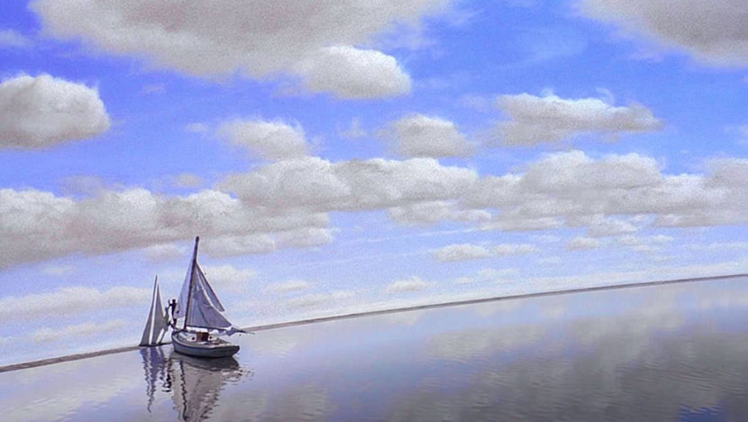 Photo of a sail boat on the water