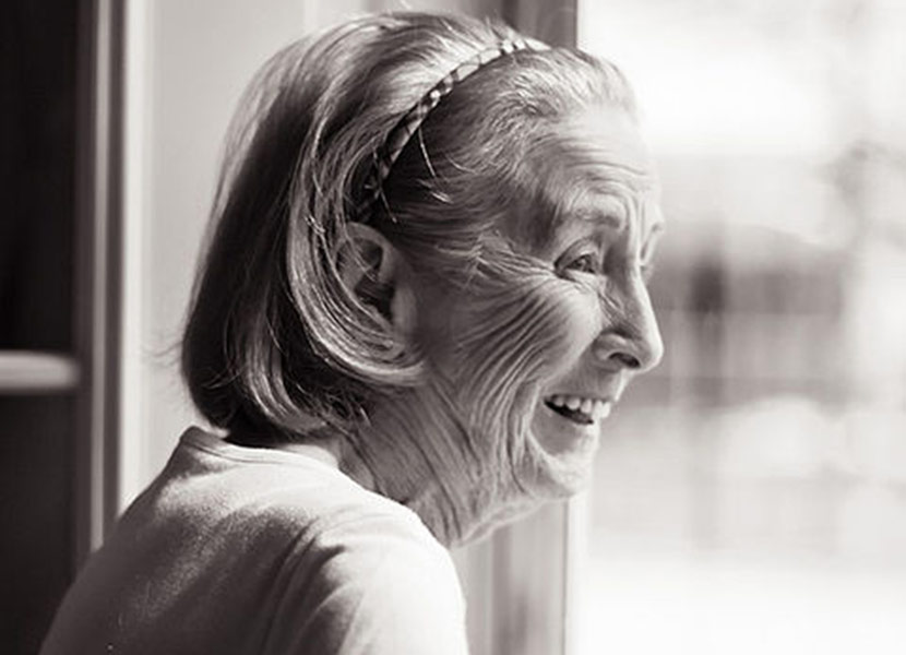 Black and white photo of senior woman smiling