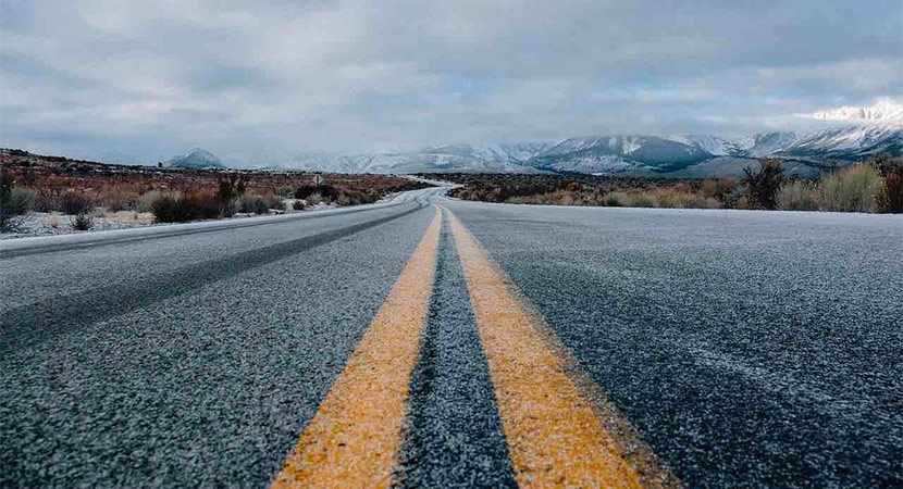 Photo of a long road with perspective into the distance